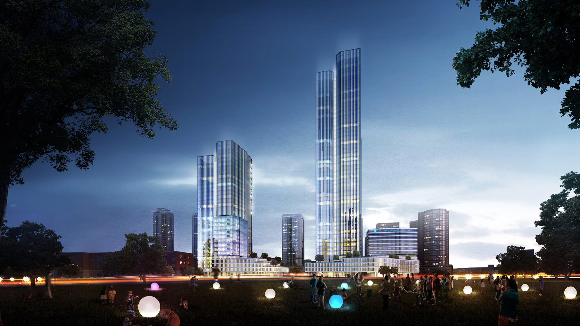 wide shot of building at night with lights and people