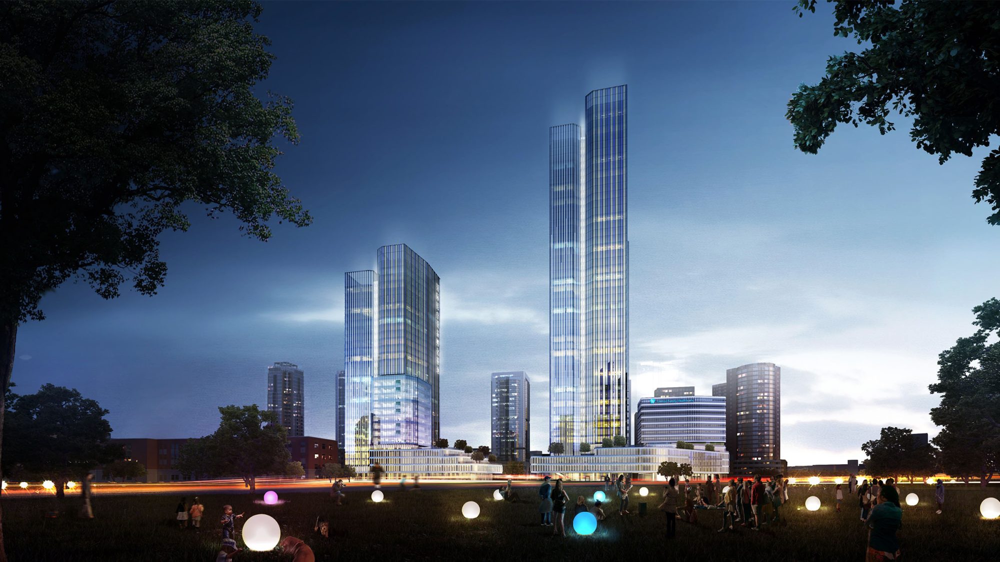 wide shot of building at night with lights and people