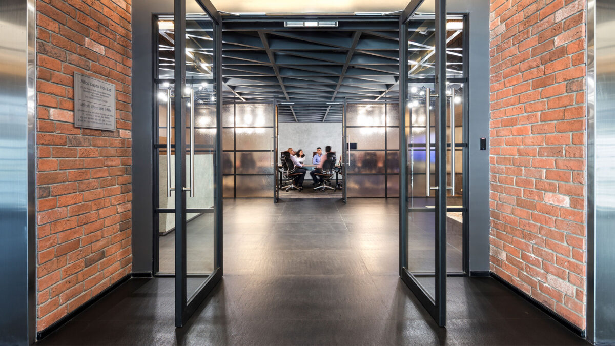 people in meeting room near reception