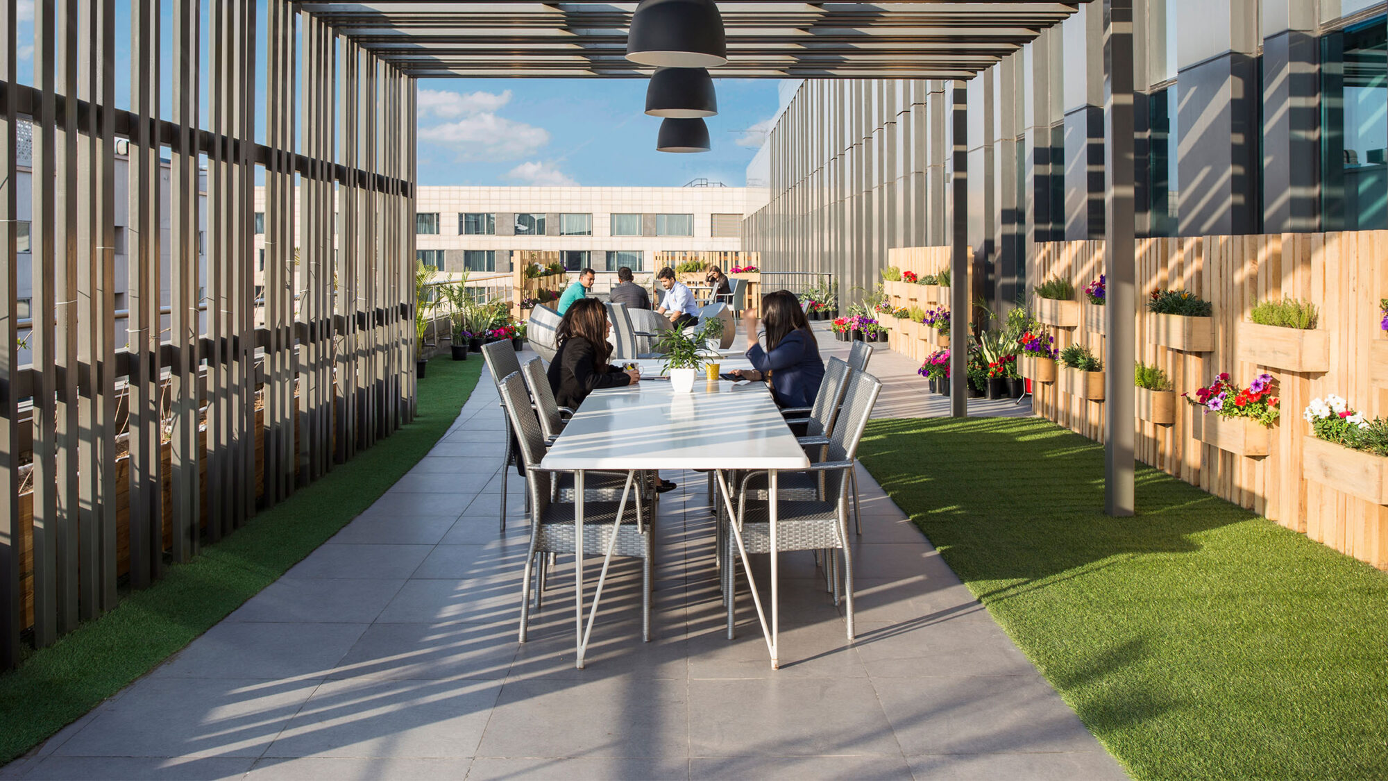 outdoor area with table and seats