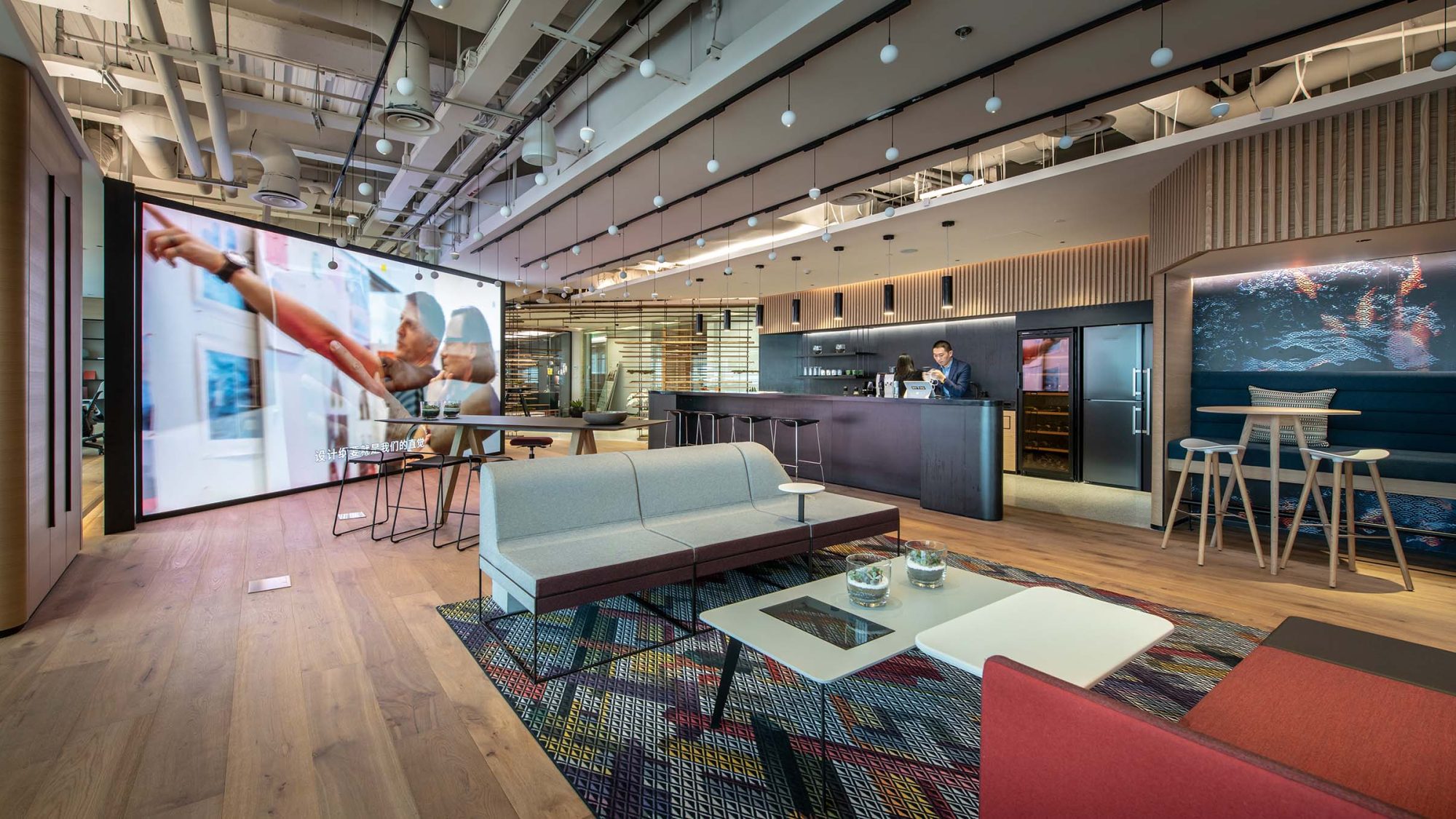 Steelcase headquarter design in Shanghai by M Moser Associates featuring interior design of corporate lounge area.