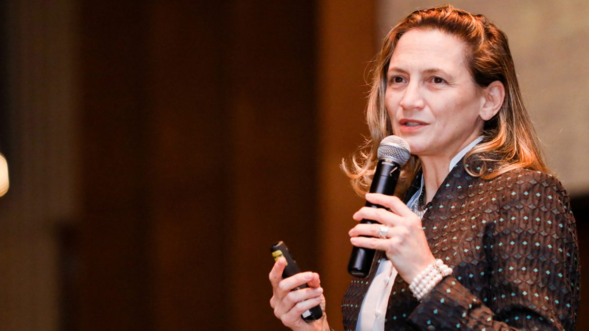 Christine talking at conference
