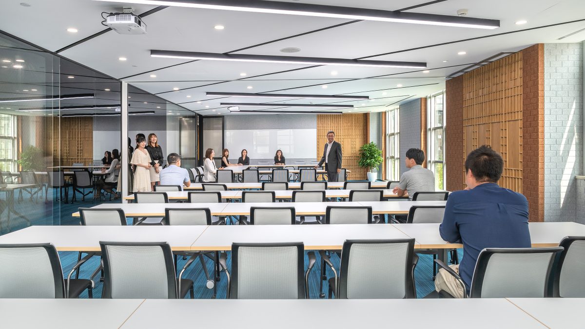 people in collaborating in conference room