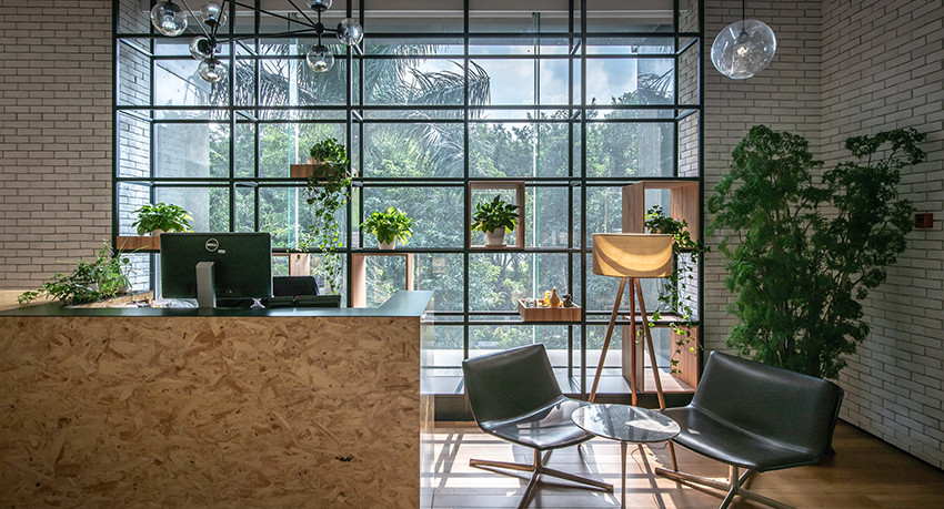 reception desk with plants