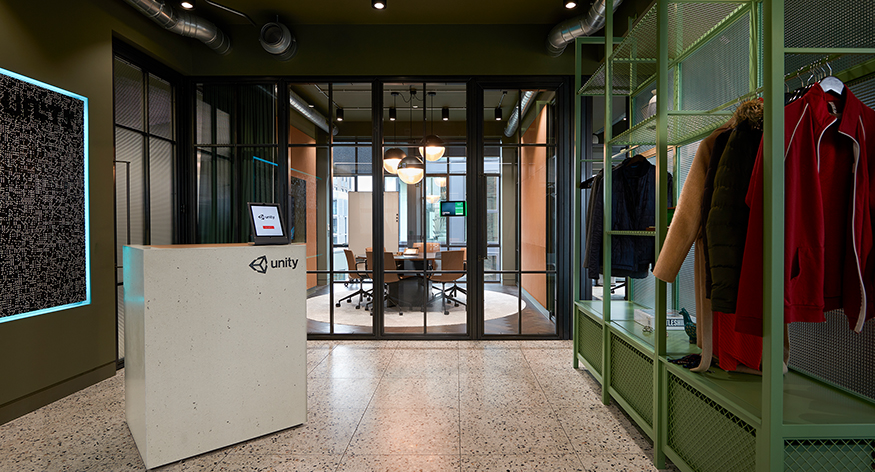 tablet on reception desk and view of meeting room