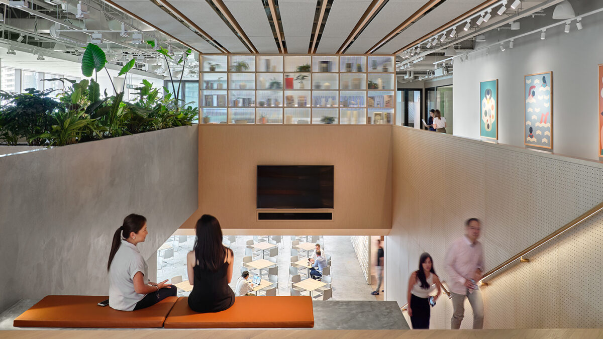 women collaborating and people walking up stairs