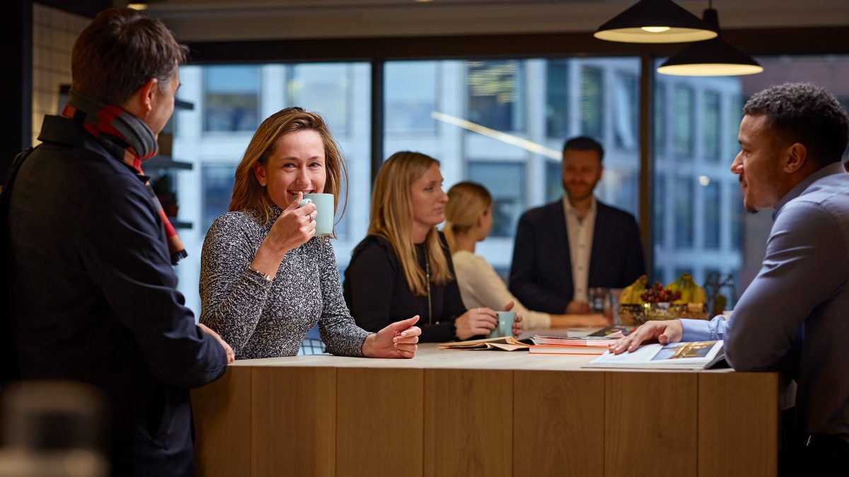 people collaborating at high table