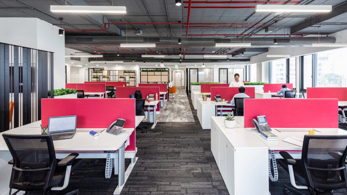 People working in open-plan office