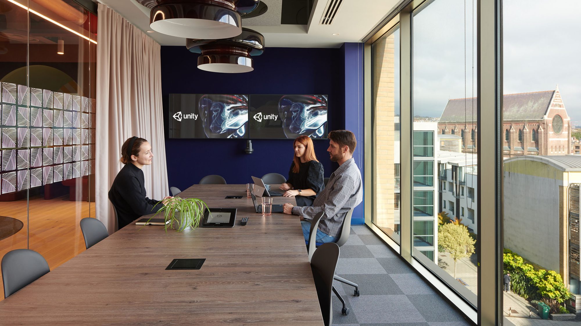 people collaborating in meeting room