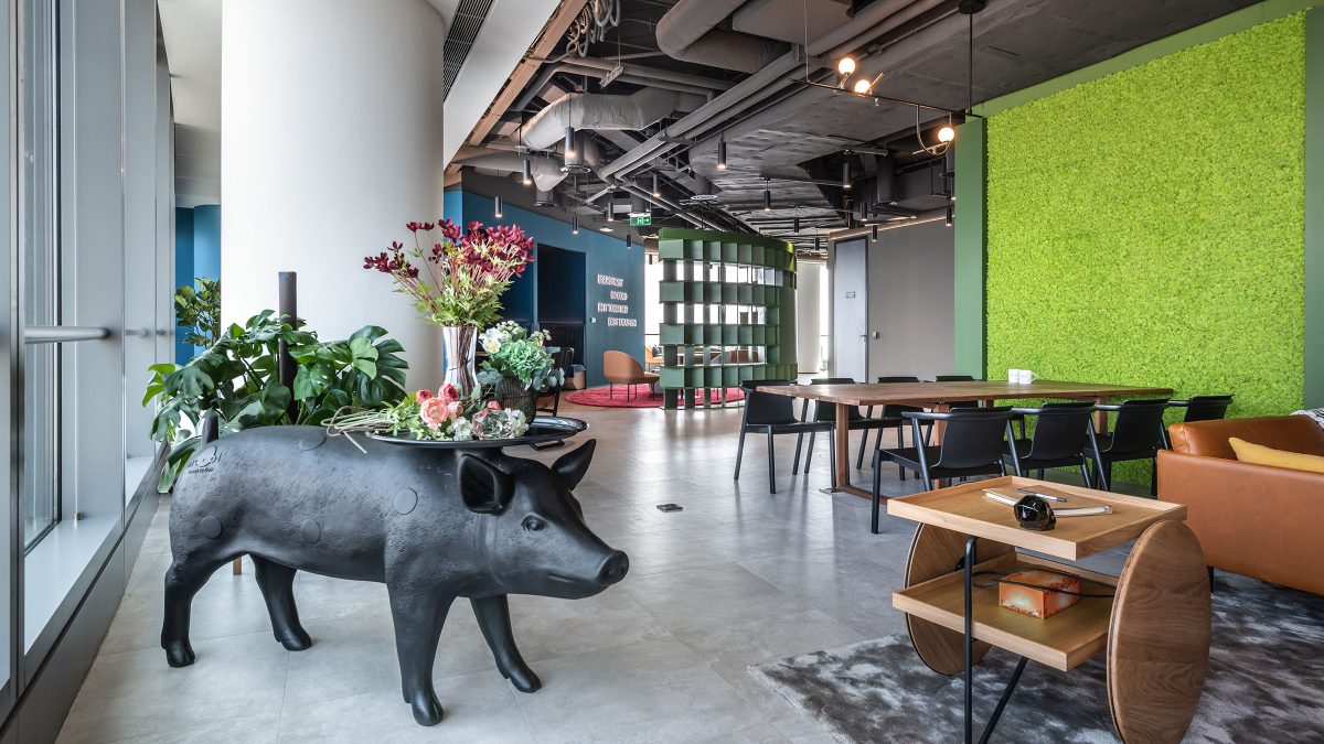 breakout area with furniture and green wall