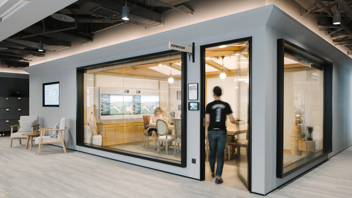 man walking into meeting room