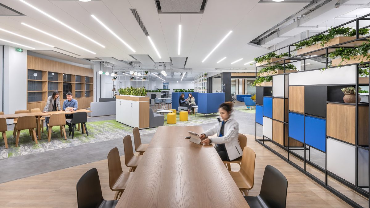 people sitting at meeting tables