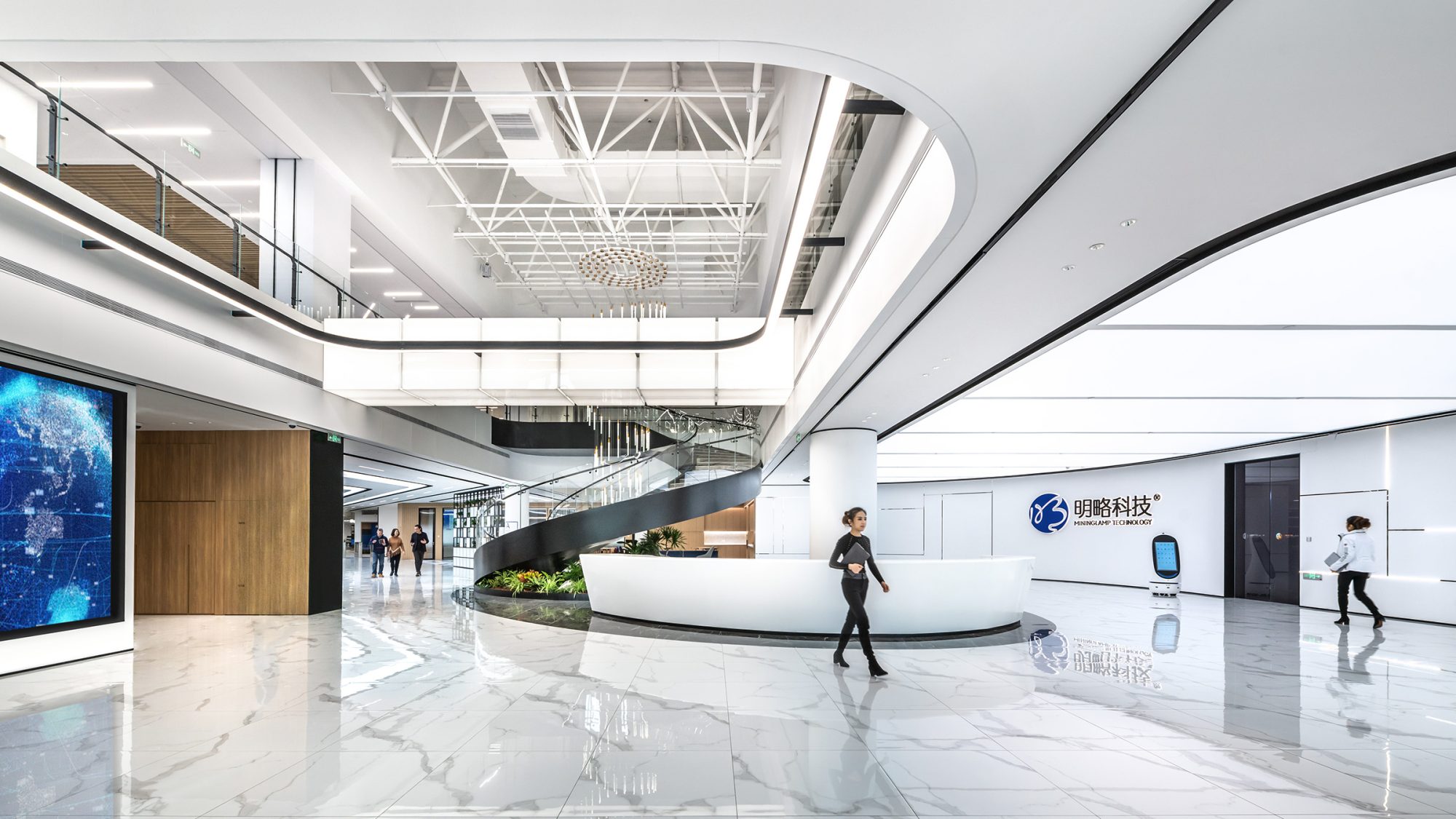 woman walking through white reception space