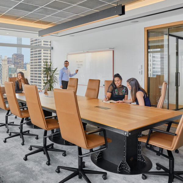 people collaborating in meeting room