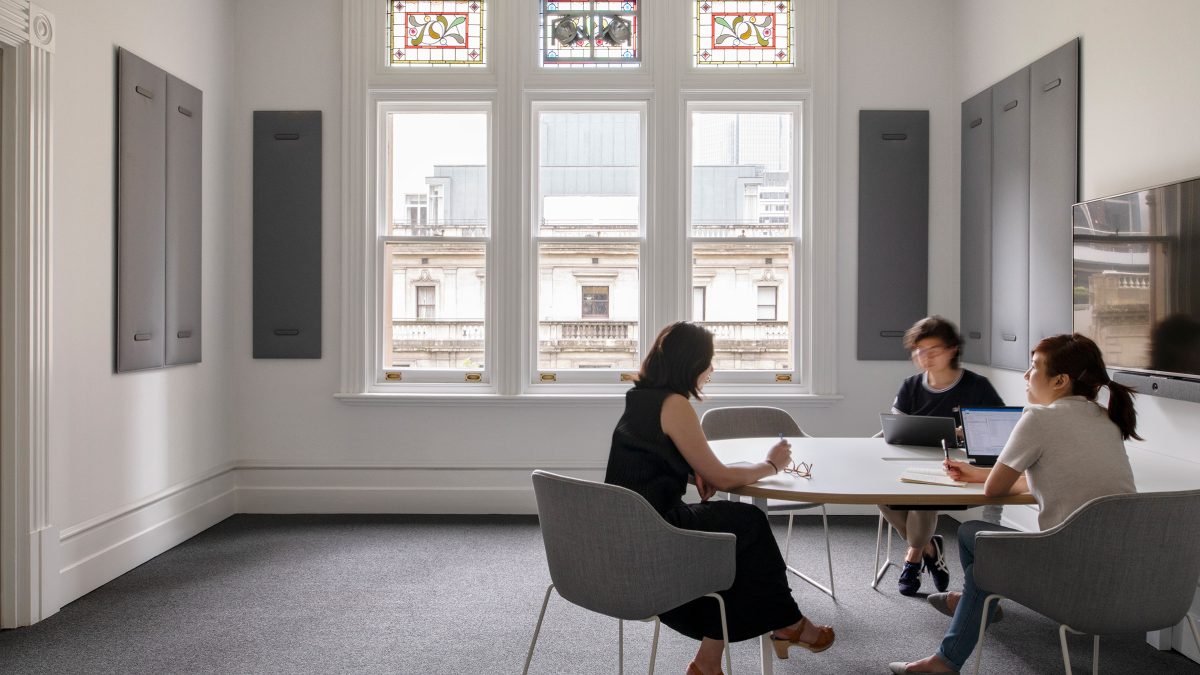 people working in meeting room