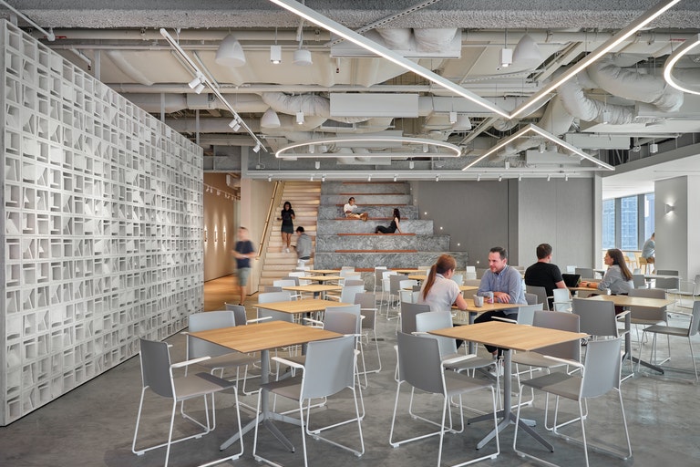 people sitting and eating in cafe