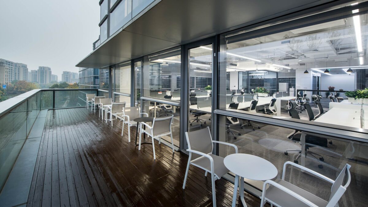 outdoor area with chairs and desks