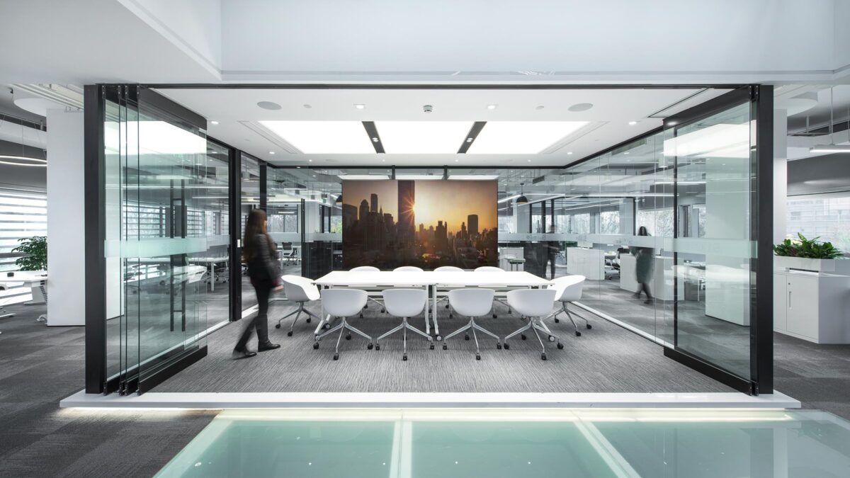 woman walking into meeting room