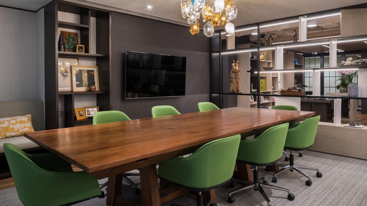 open boardroom, long desk green chairs