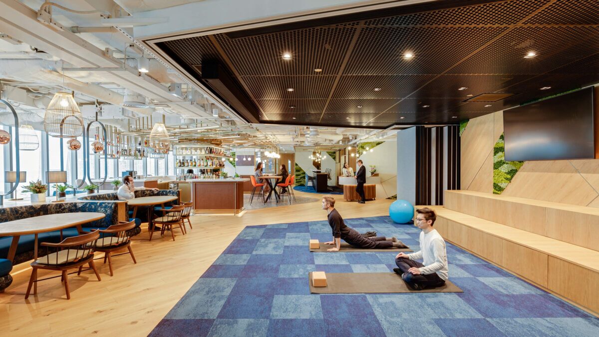 people doing yoga in the office