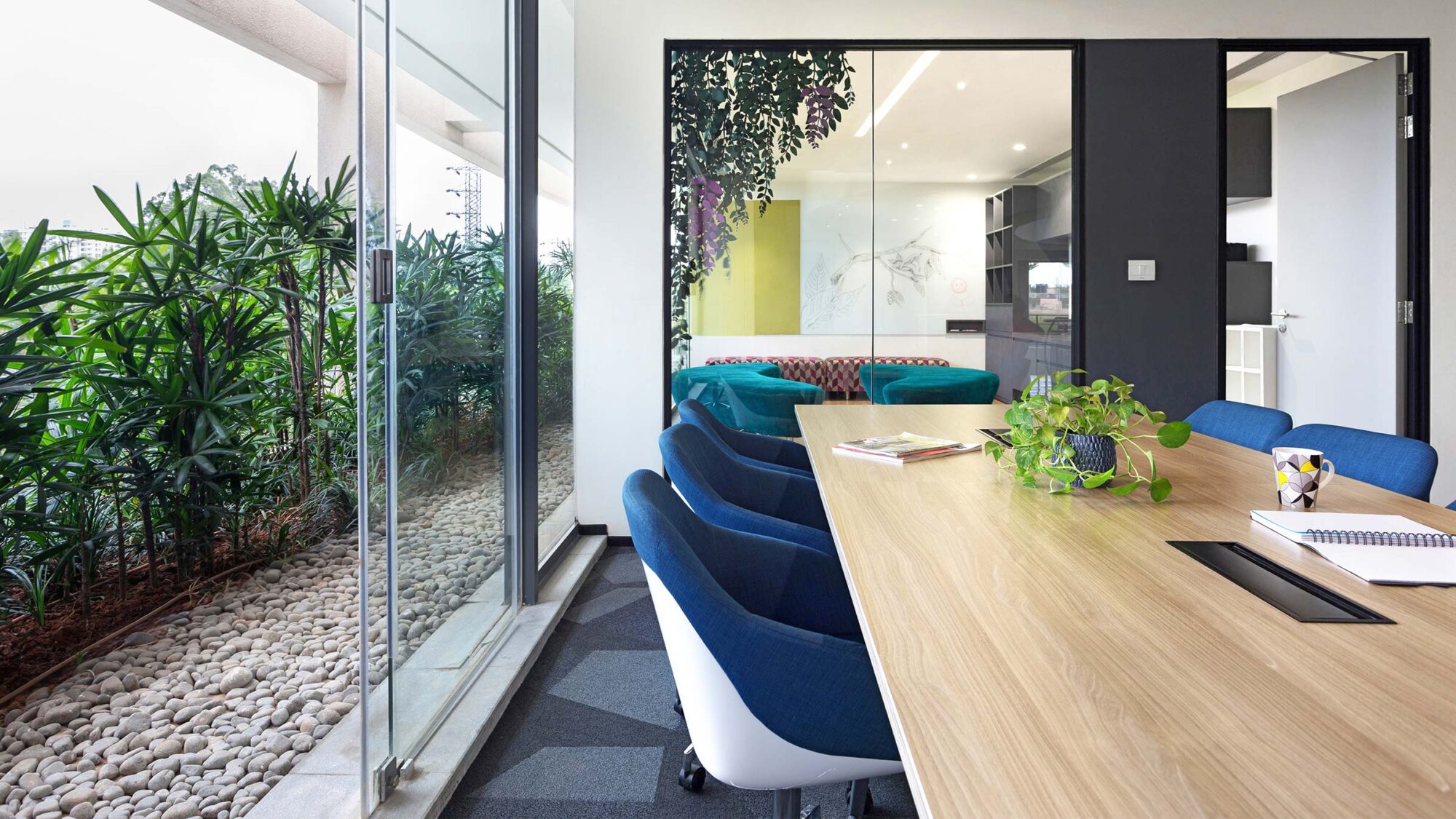 desk with plant and view of balcony