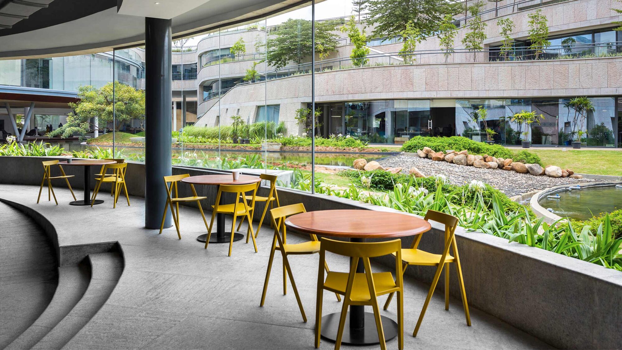 desks with view of outdoor plants and trees