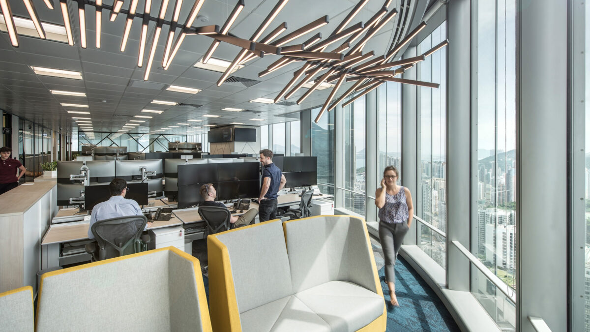 sculptural light hanging over office space