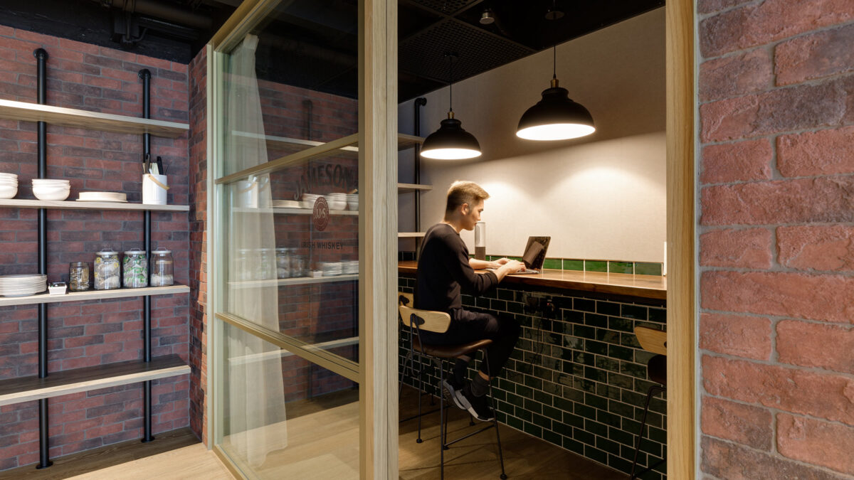 man working on high bench in quiet room