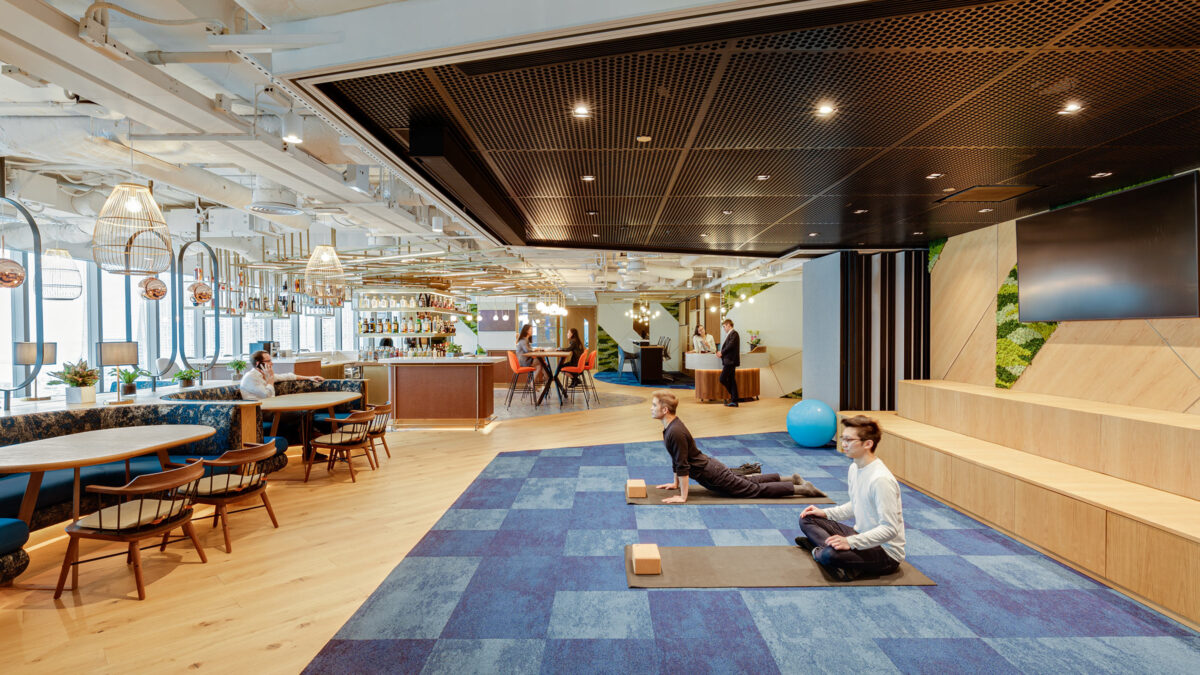 people doing yoga in the office