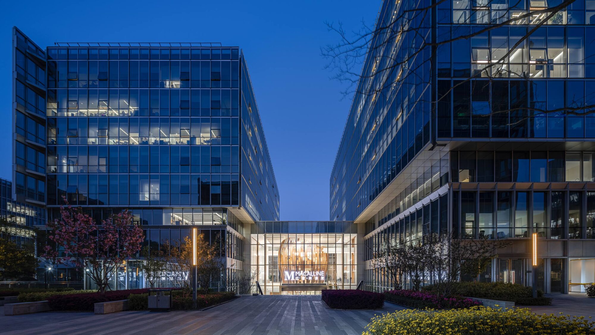 red star macalline campus exterior at night