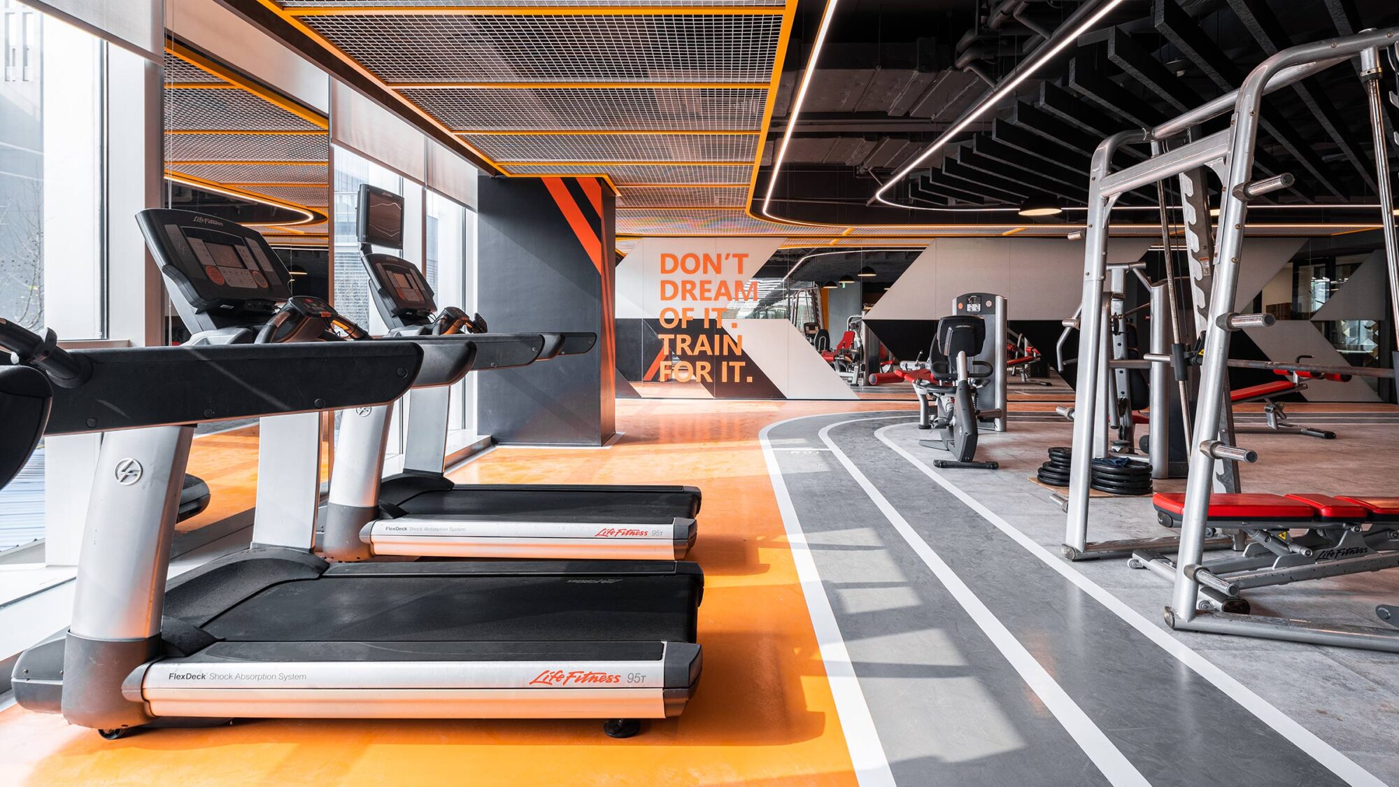 office gym with running machines and track