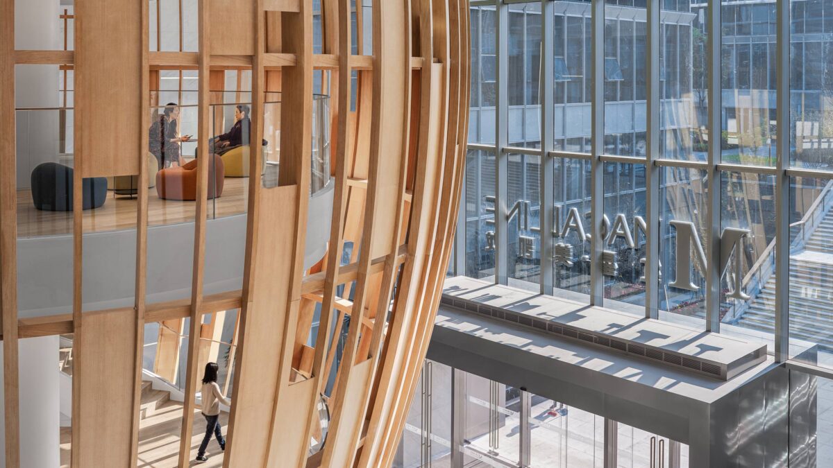 view above reception looking at wooden stair 