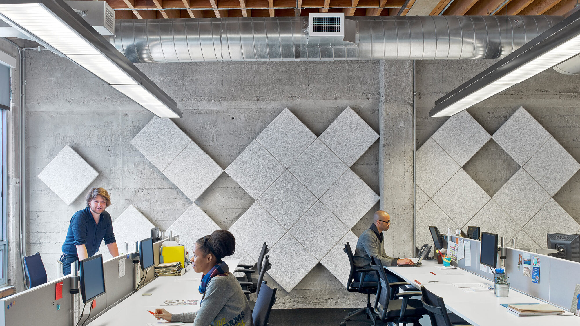 open plan workspace with concrete walls