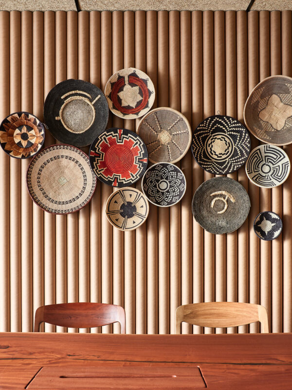 detail of textured wall and plates hanging