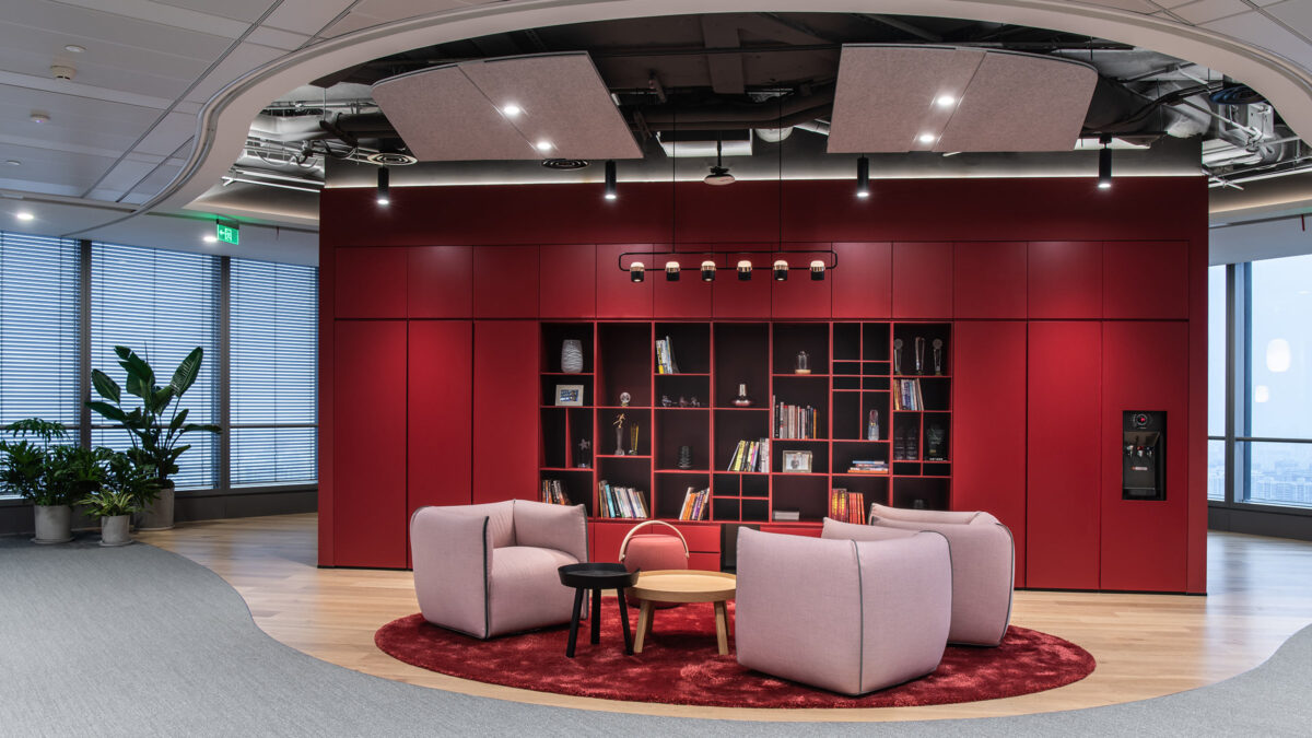 workplace interior library setting in red and pink