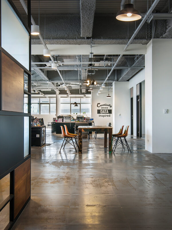 desks with slogan on wall