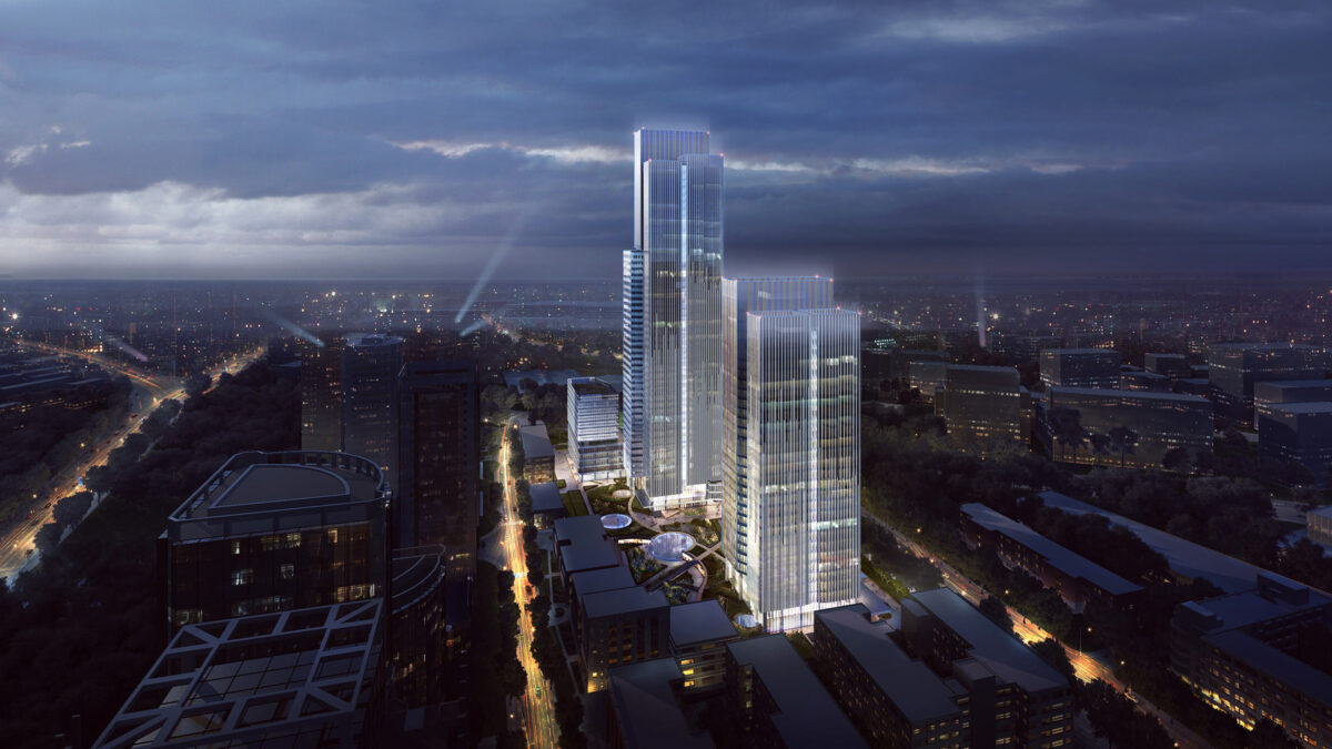 overhead shot of building at night in city with lights