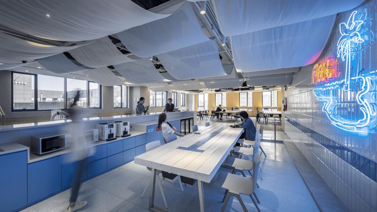 people in kitchen space at table and counter