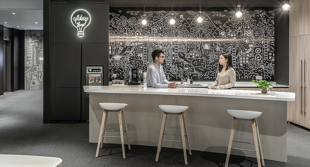 people collaborating in kitchen space