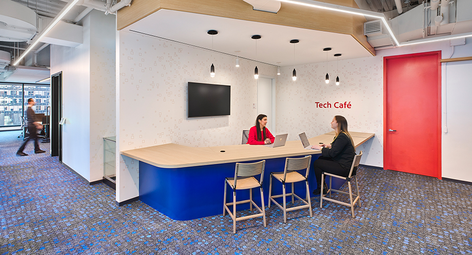 women collaborating at desk