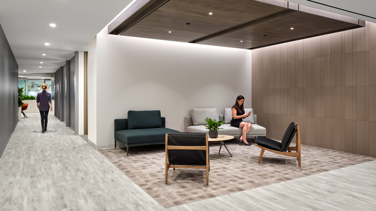 woman in lounge and woman in corridor