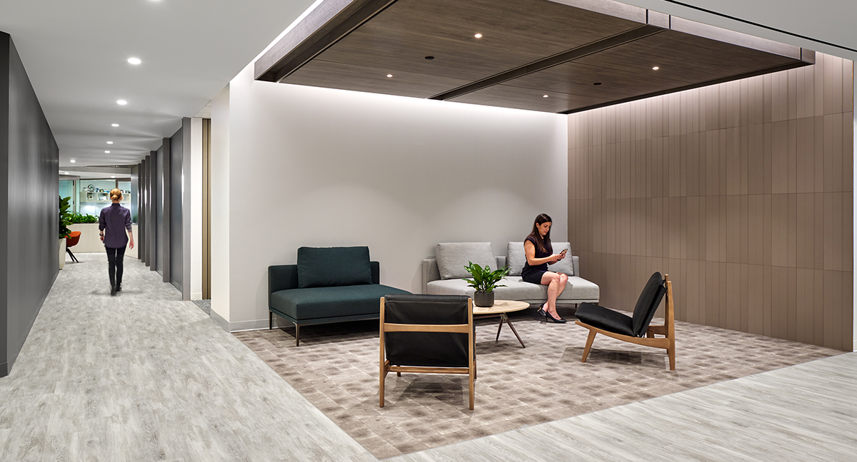 woman in lounge and woman in corridor
