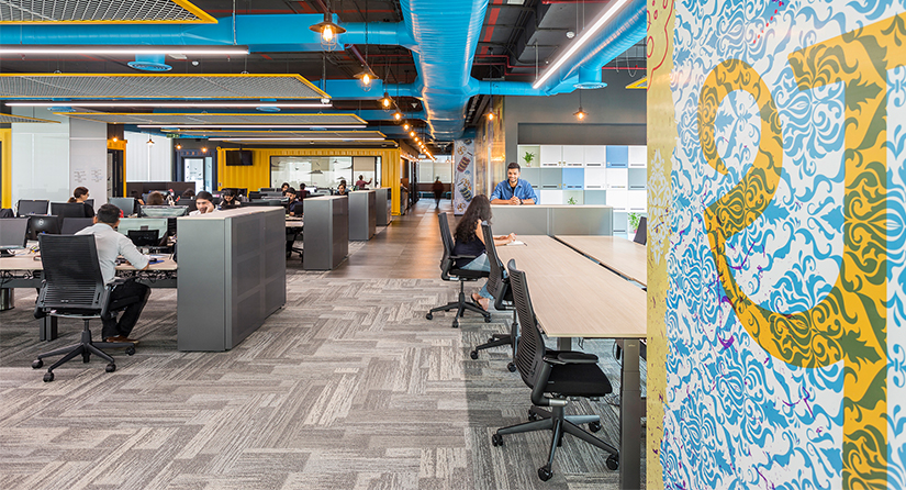 people working in open plan office