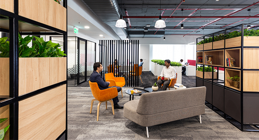 men collaborating in open seated space