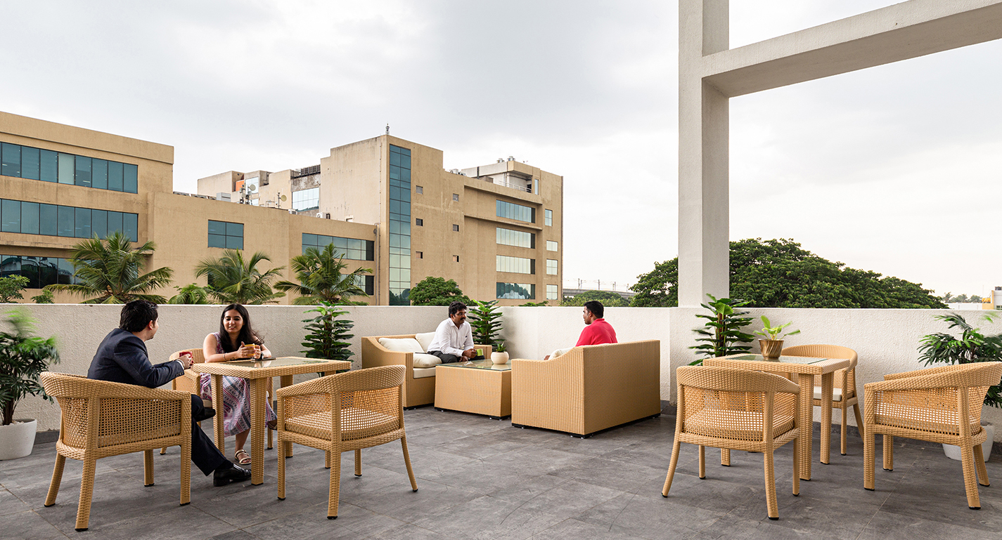 people talking in outdoor space
