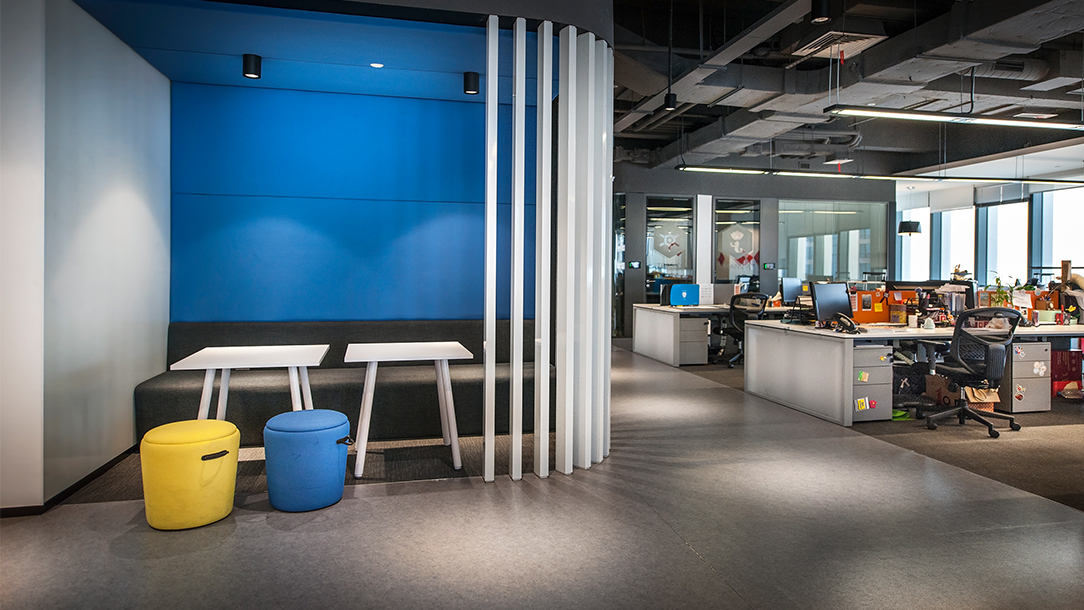 meeting room with small yellow and blue seat