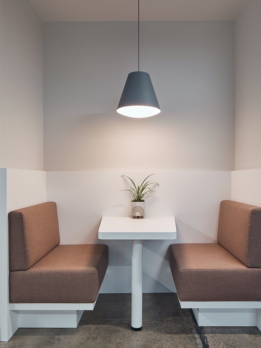 booth with plant on table