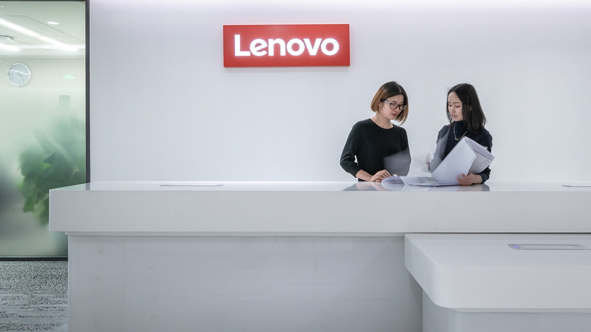 people collaborating at reception desk