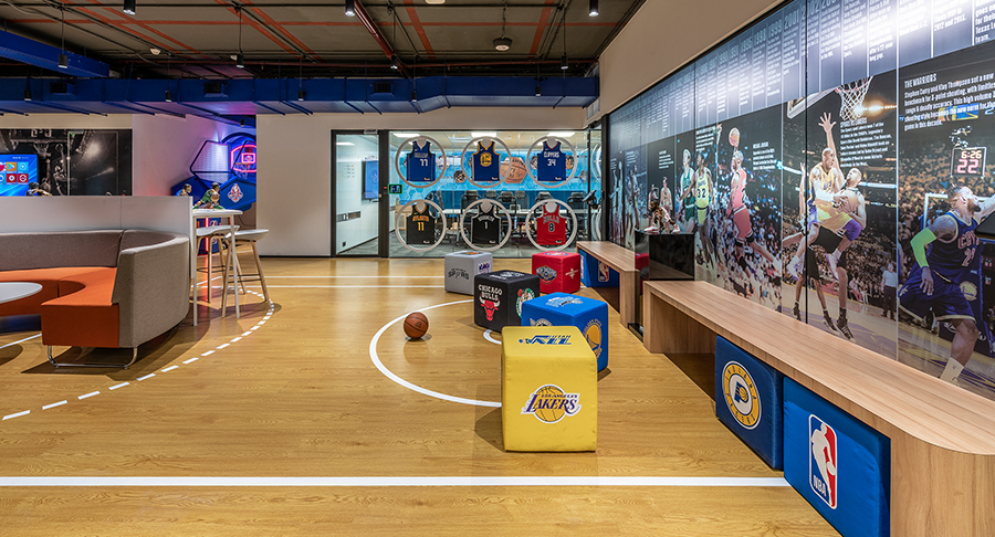 casual seating area with small chairs and basketball
