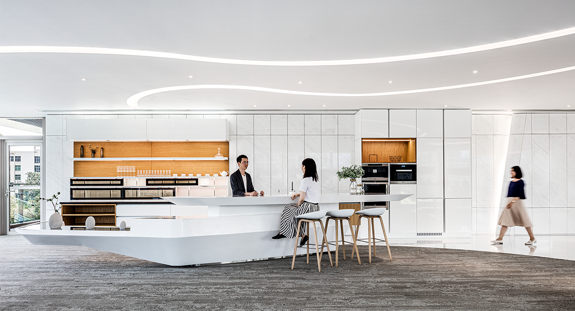 people collaborating in kitchen